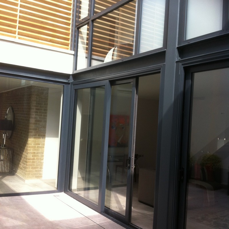 Anthracite aluminium sliding patio doors fitted in Hampton